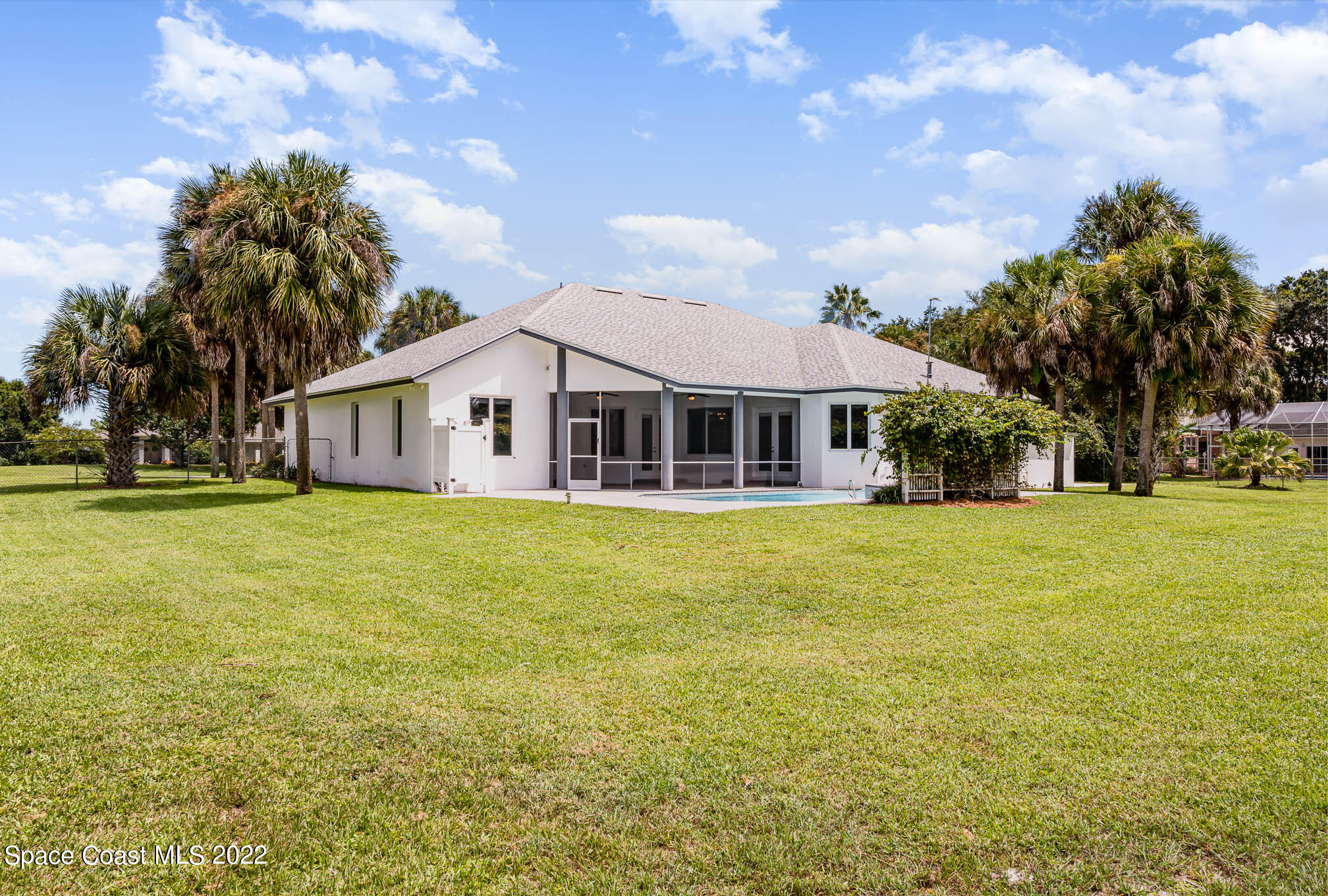 3920 Postridge Trail Melbourne, FL 32934 - Photo 47 of 52 a front view of house with yard and green space