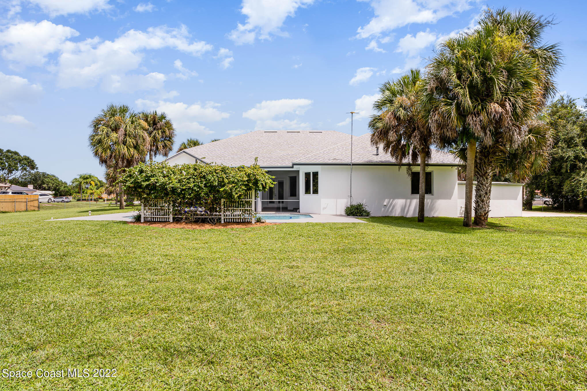 3920 Postridge Trail Melbourne, FL 32934 - Photo 48 of 52 a view of a house with a big yard