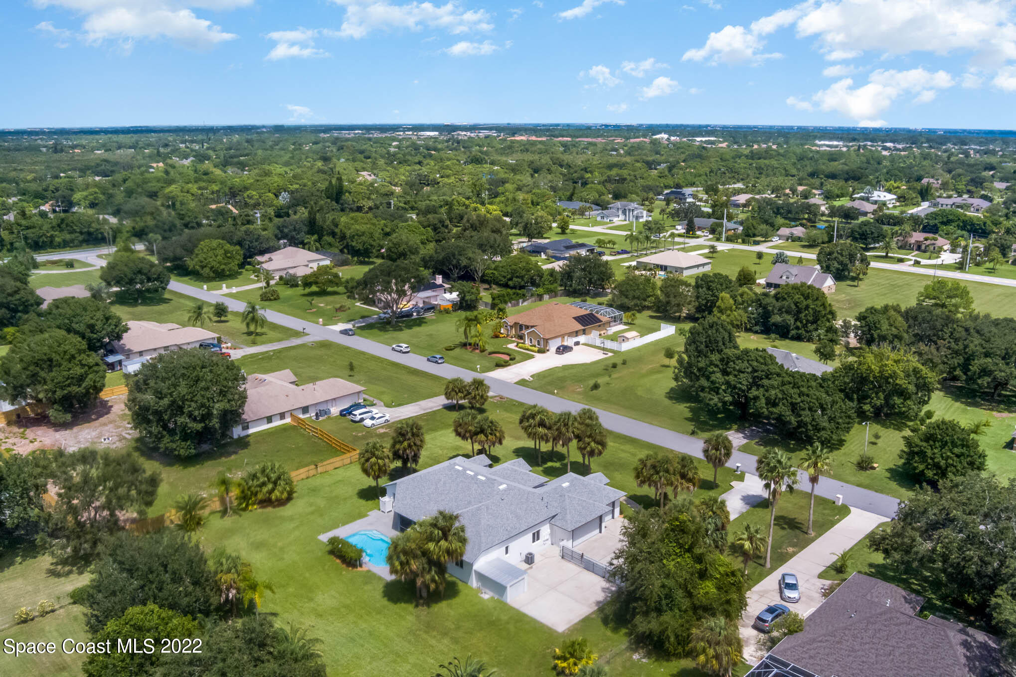 3920 Postridge Trail Melbourne, FL 32934 - Photo 50 of 52 an aerial view of residential houses with outdoor space and street view
