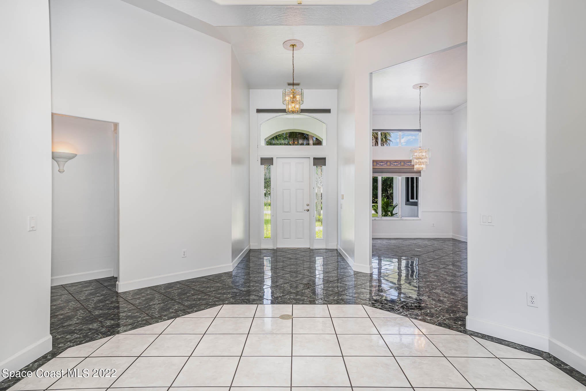 3920 Postridge Trail Melbourne, FL 32934 - Photo 5 of 52 a view of a hallway with front door