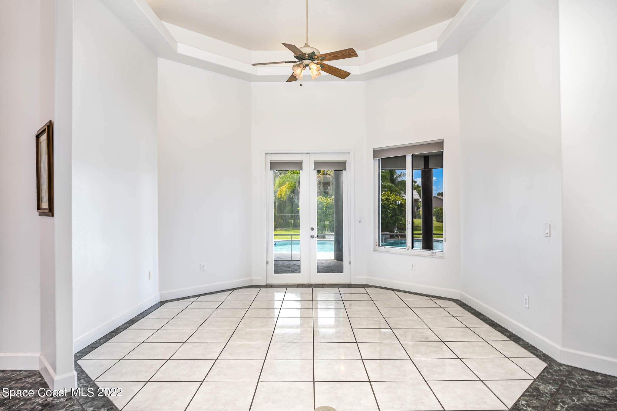 3920 Postridge Trail Melbourne, FL 32934 - Photo 6 of 52 a view of an empty room with a window