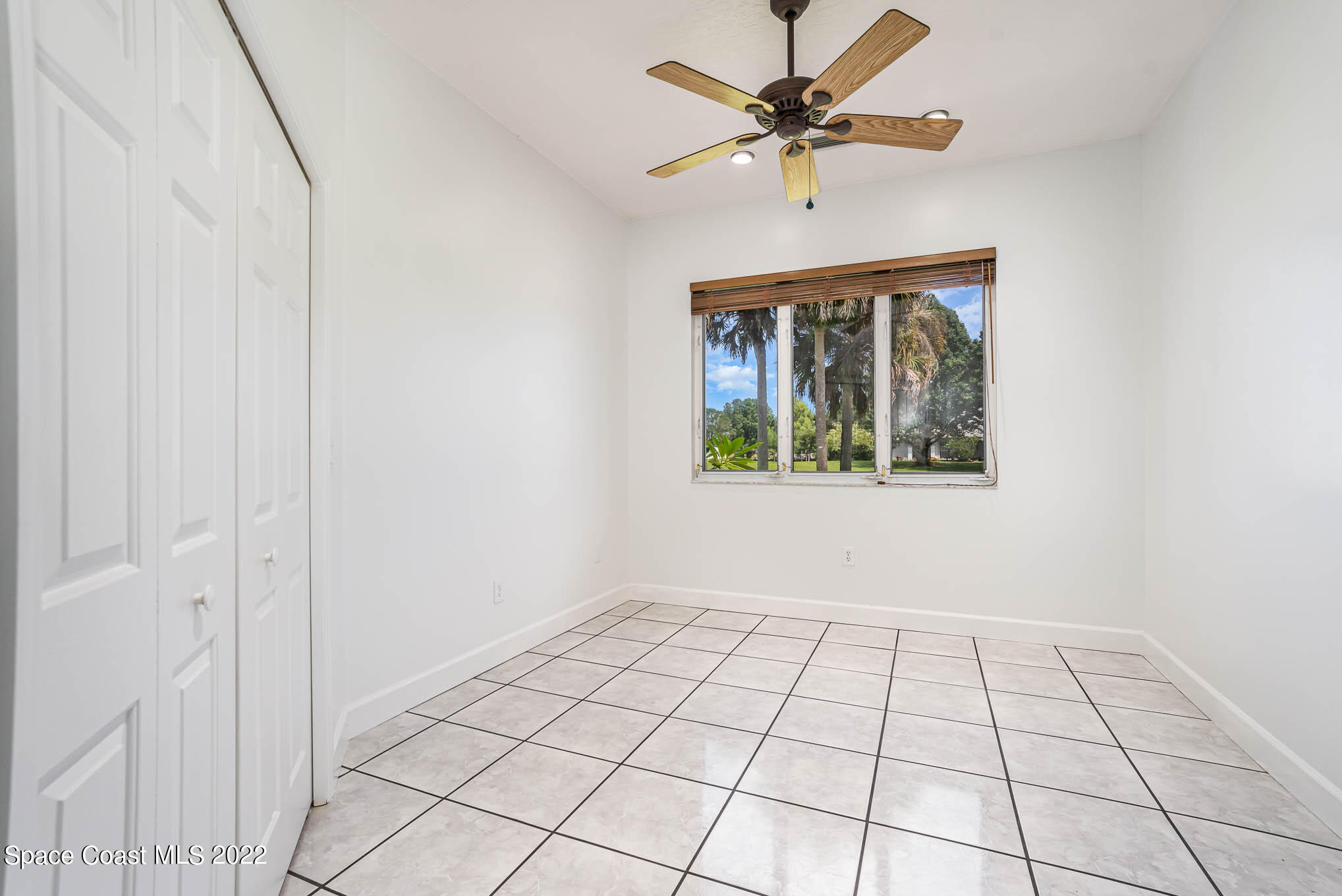 3920 Postridge Trail Melbourne, FL 32934 - Photo 8 of 52 a view of an empty room with a window
