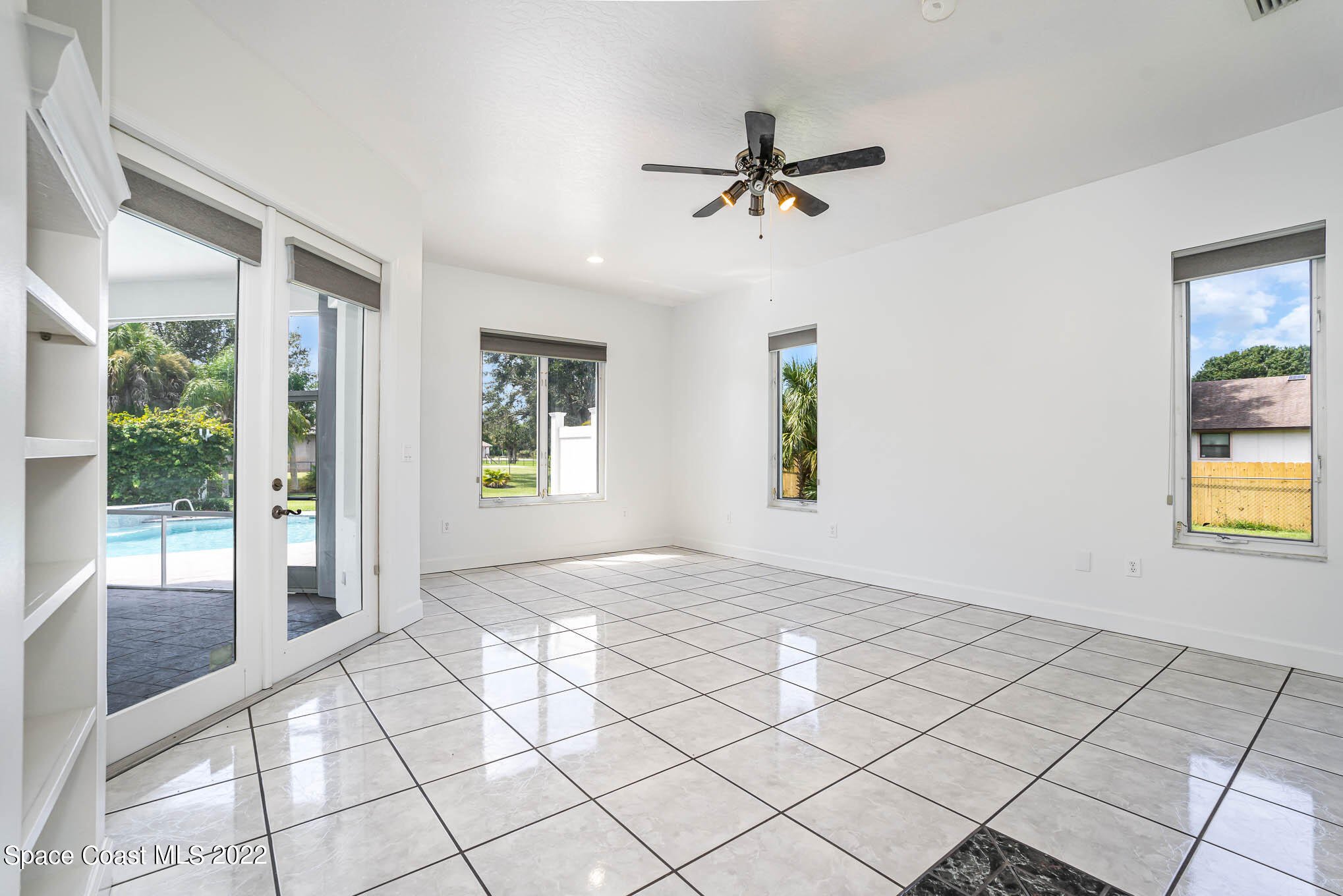 3920 Postridge Trail Melbourne, FL 32934 - Photo 10 of 52 a view of an empty room and window