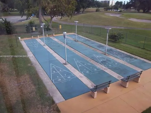 a view of swimming pool with a yard