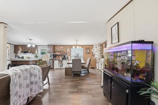 12947 Ralston Drive Conroe, TX 77306 - Photo 8 of 24 a living room with furniture and a flat screen tv