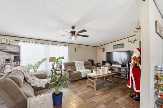 12947 Ralston Drive Conroe, TX 77306 - Photo 9 of 24 a living room with furniture and a window