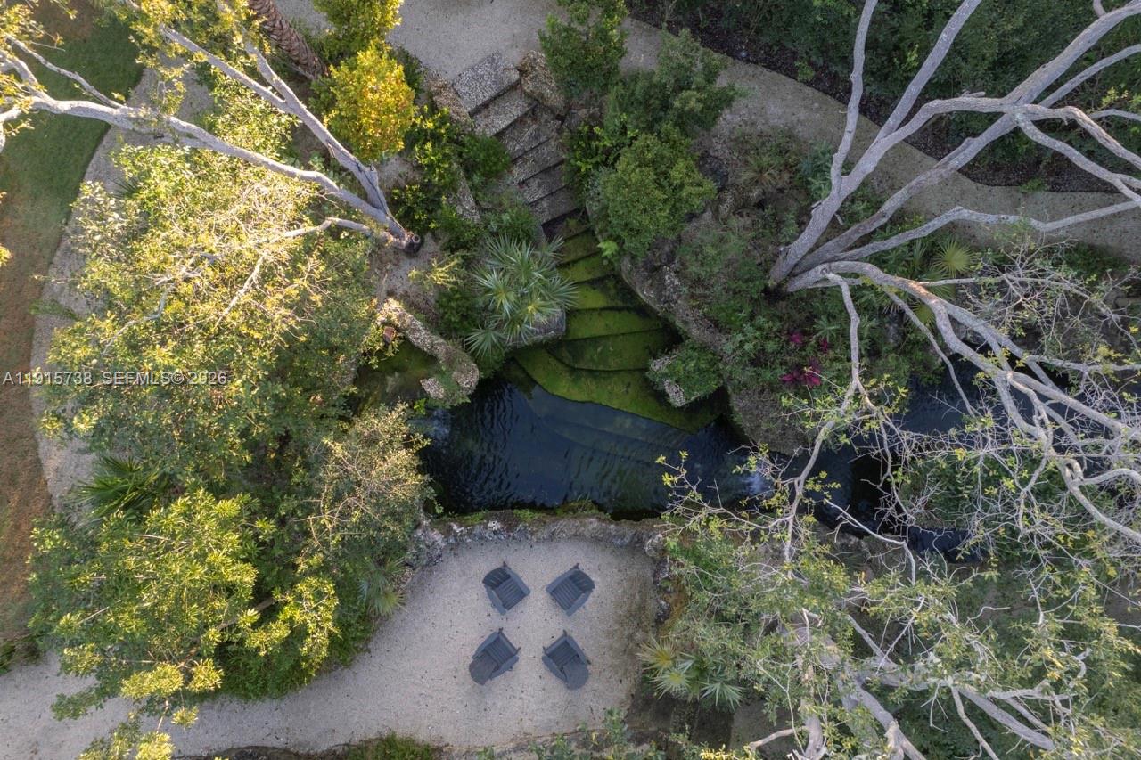 12050 Moss Ranch Road Pinecrest, FL 33156 - Photo 32 of 33 a view of yard with green space