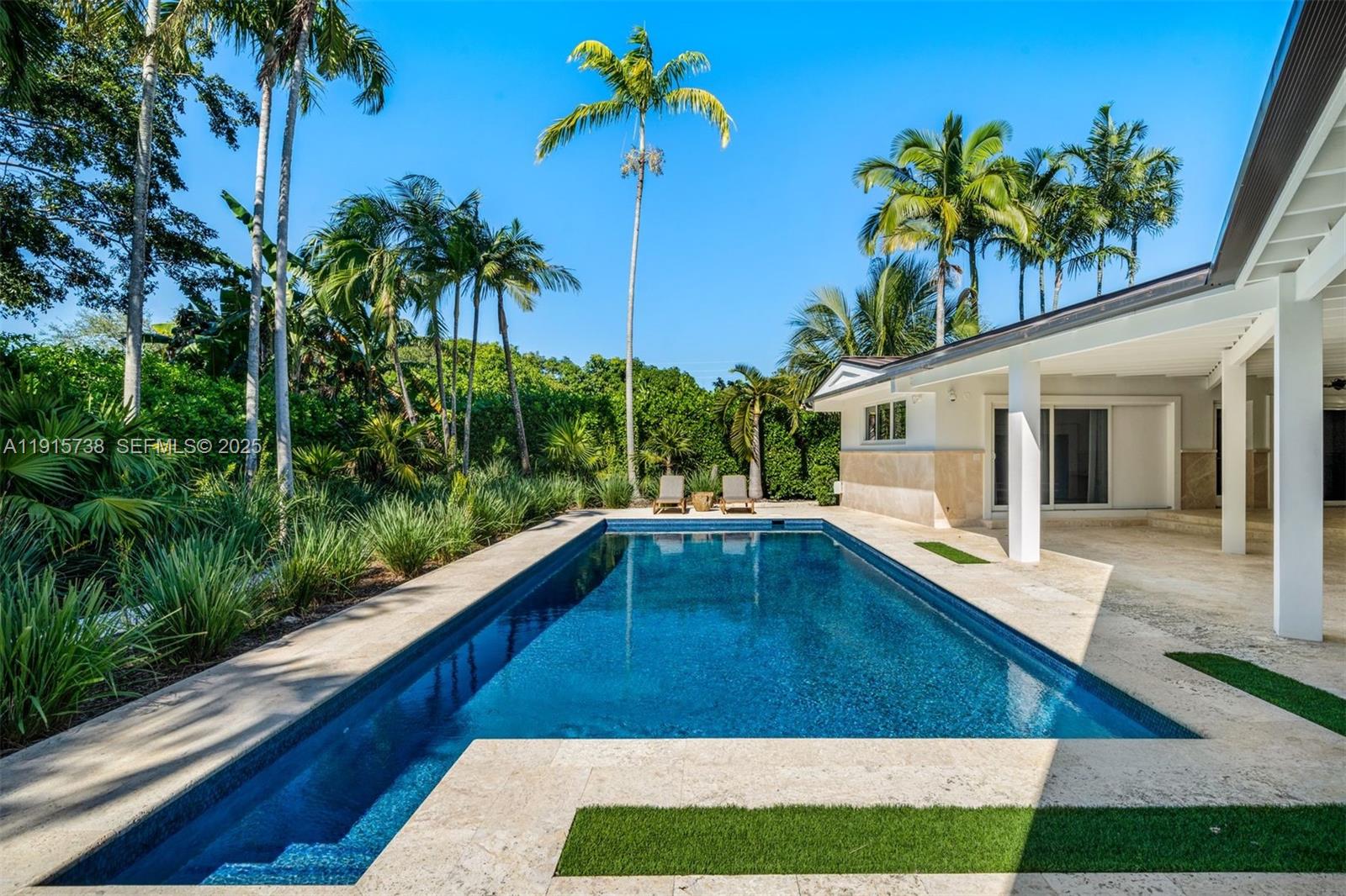12050 Moss Ranch Road Pinecrest, FL 33156 - Photo 10 of 27 a view of swimming pool with a yard
