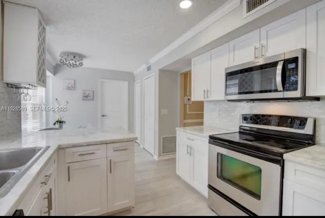 $9,300 | 12980 Blue Lake Drive, Wellington, FL 33414