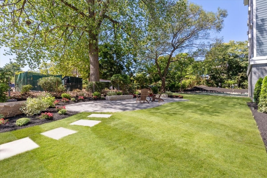 21 Totman Street, Unit MODEL2 Quincy, MA 02169 - Photo 18 of 18 a view of swimming pool with lawn chairs and plants