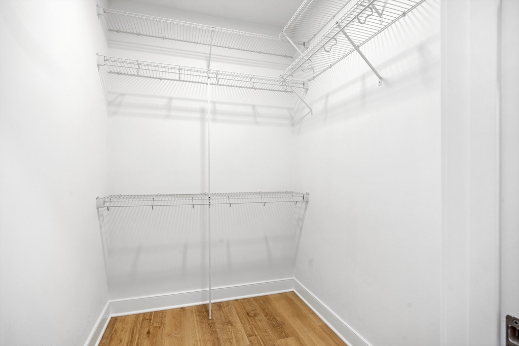 21 Totman Street, Unit MODEL2 Quincy, MA 02169 - Photo 9 of 18 a view of a room with racks on the wall