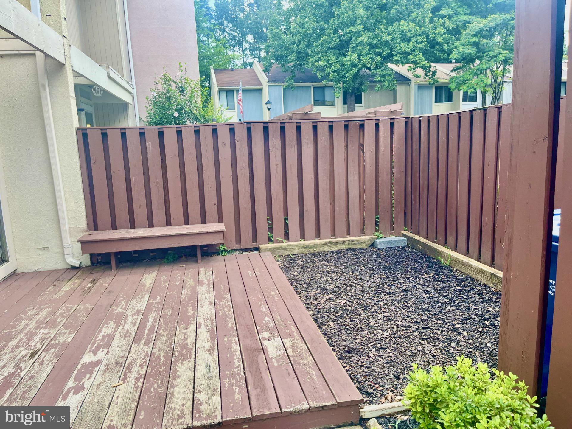 2250 Southgate Square Reston, VA 20191 - Photo 3 of 21 a view of backyard with wooden fence