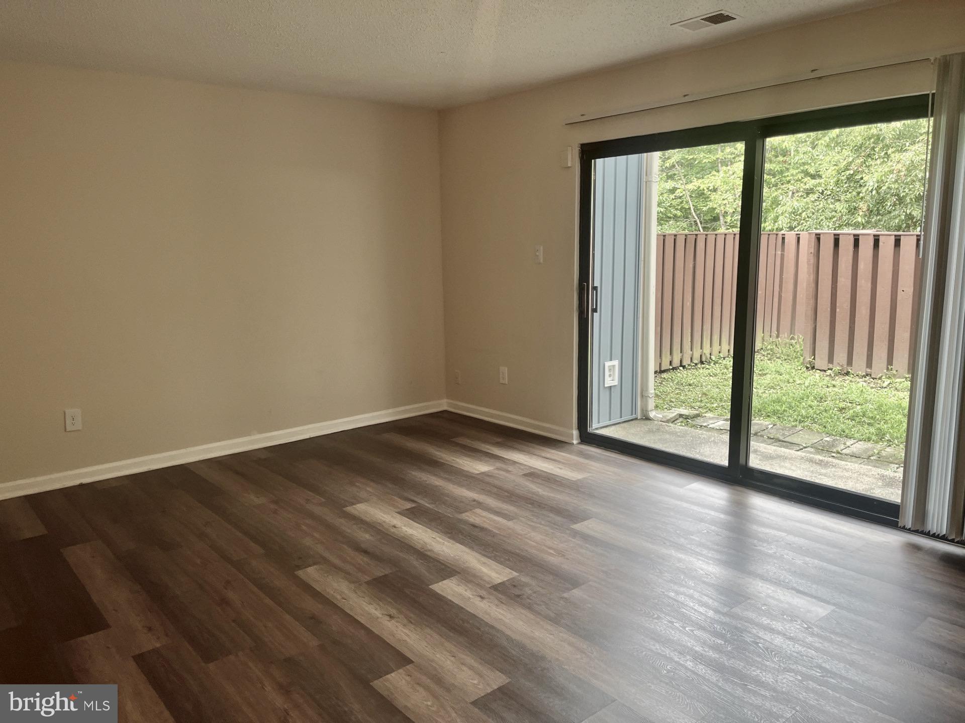 2250 Southgate Square Reston, VA 20191 - Photo 8 of 21 a view of a room with wooden floor and doors