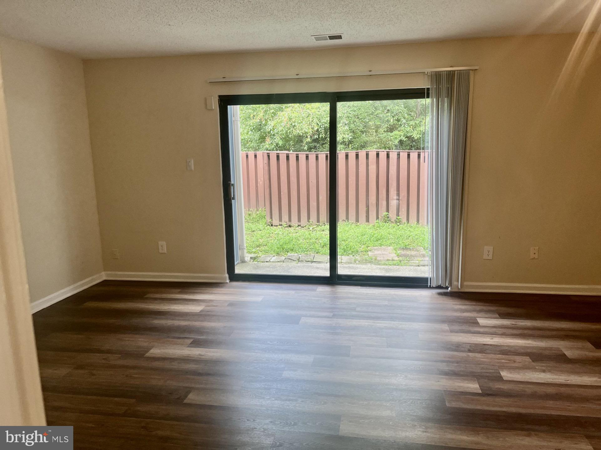 2250 Southgate Square Reston, VA 20191 - Photo 9 of 21 a view of a room with wooden floor and a window