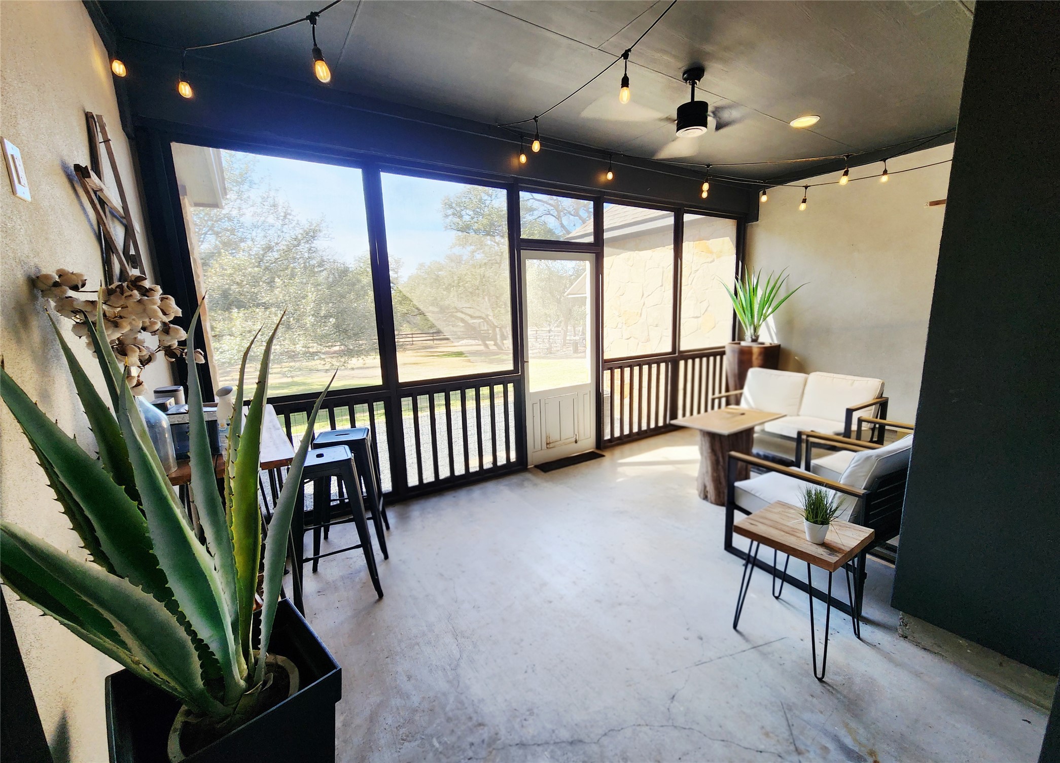 152 Silver Hawk Court Dripping Springs, TX 78620 - Photo 28 of 31 a living room with furniture and a large window