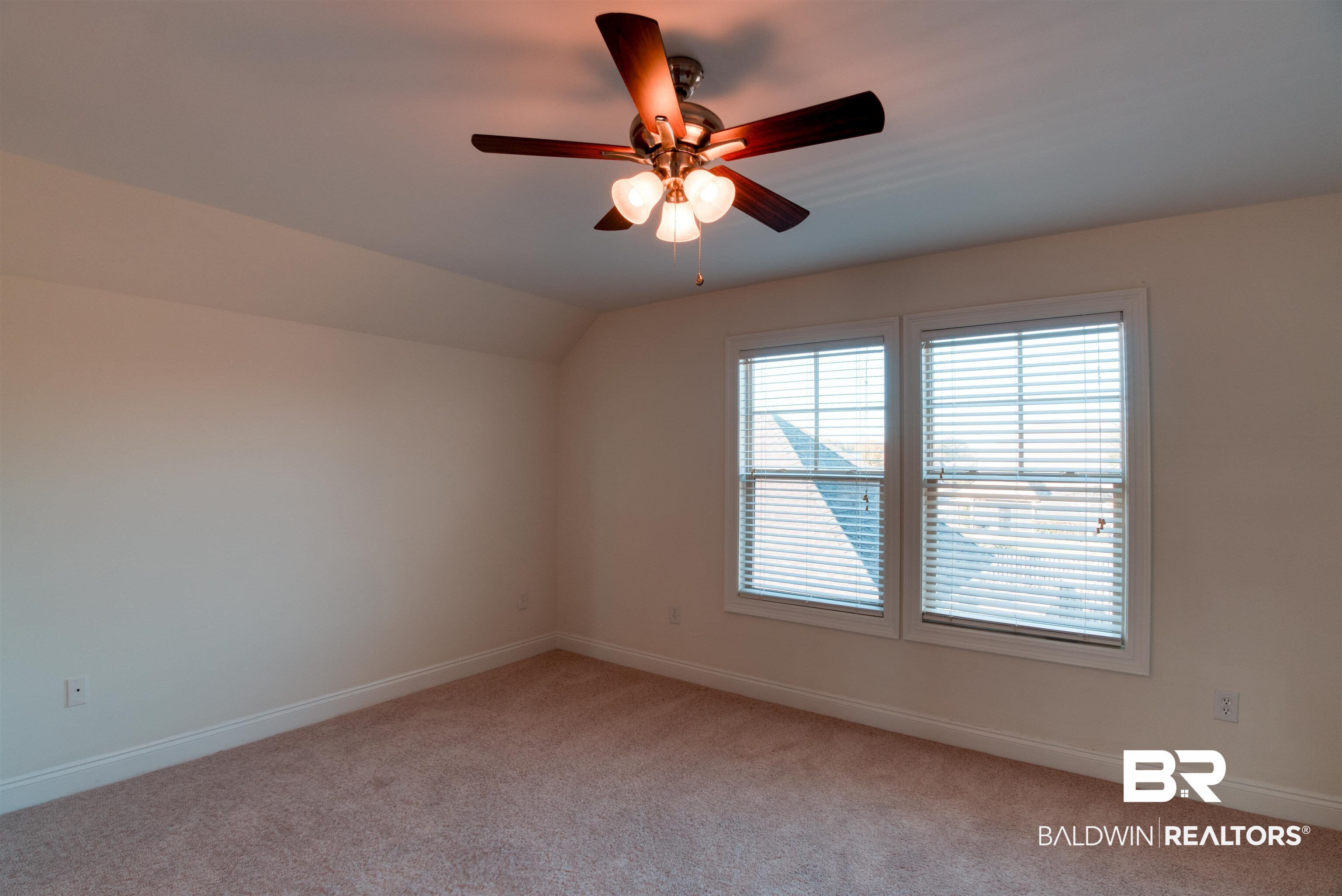 24561 Austin Road Daphne, AL 36526 - Photo 36 of 57 Spare room with light carpet, ceiling fan, and vaulted ceiling