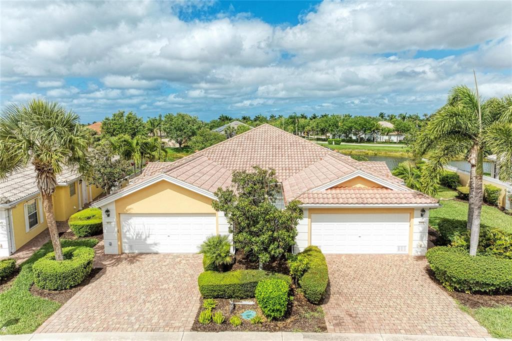 6073 Erice Street Venice, FL 34293 - Photo 2 of 71 a view of a house with a yard and front area