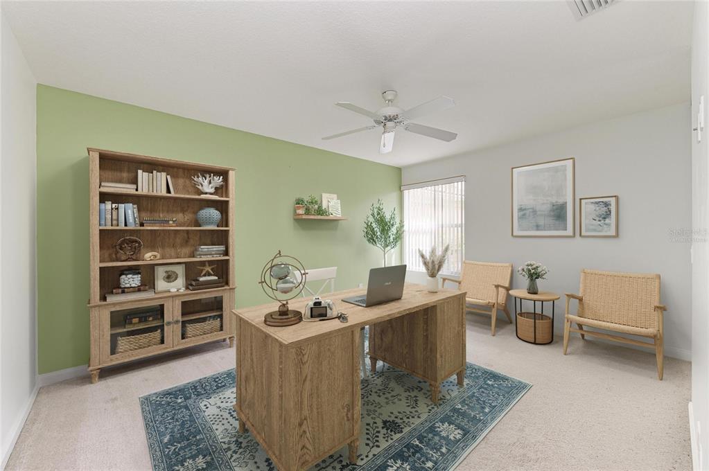 6073 Erice Street Venice, FL 34293 - Photo 31 of 71 a living room with furniture and a window