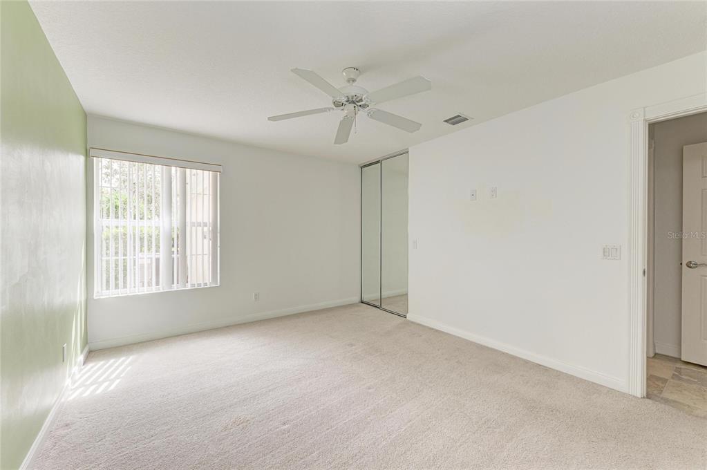 6073 Erice Street Venice, FL 34293 - Photo 33 of 71 a view of an empty room with a window