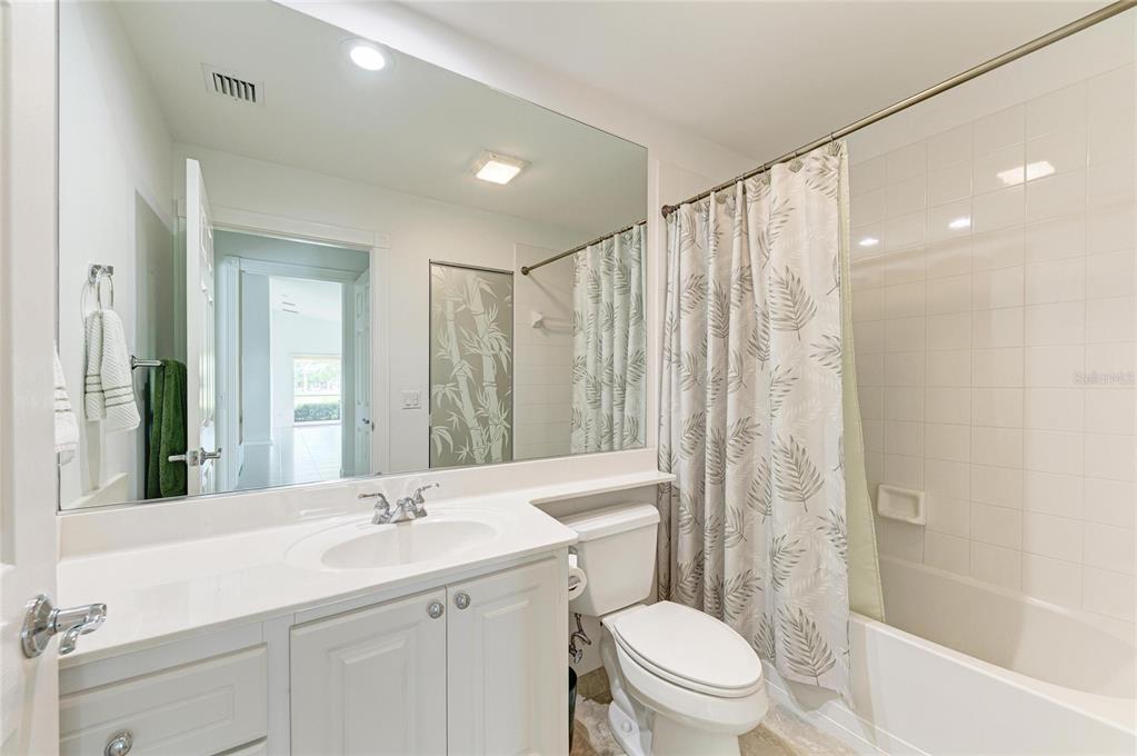 6073 Erice Street Venice, FL 34293 - Photo 35 of 71 a bathroom with a sink a toilet and shower