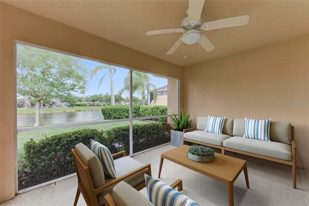 6073 Erice Street Venice, FL 34293 - Photo 41 of 71 a living room with furniture and a large window