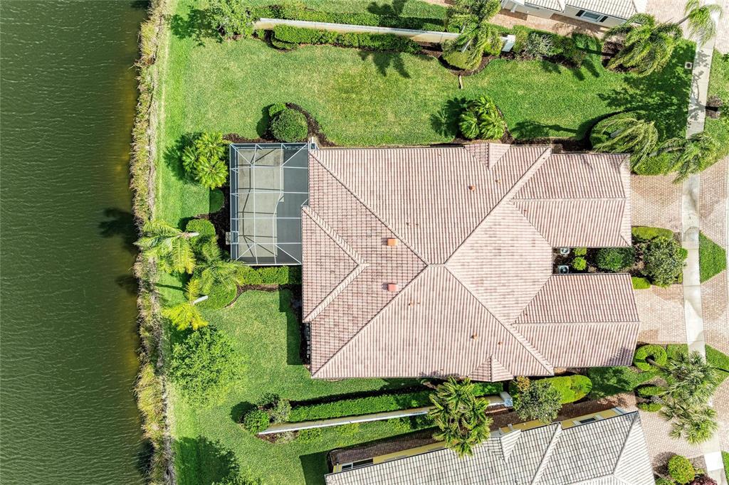 6073 Erice Street Venice, FL 34293 - Photo 51 of 71 an aerial view of a house with a yard