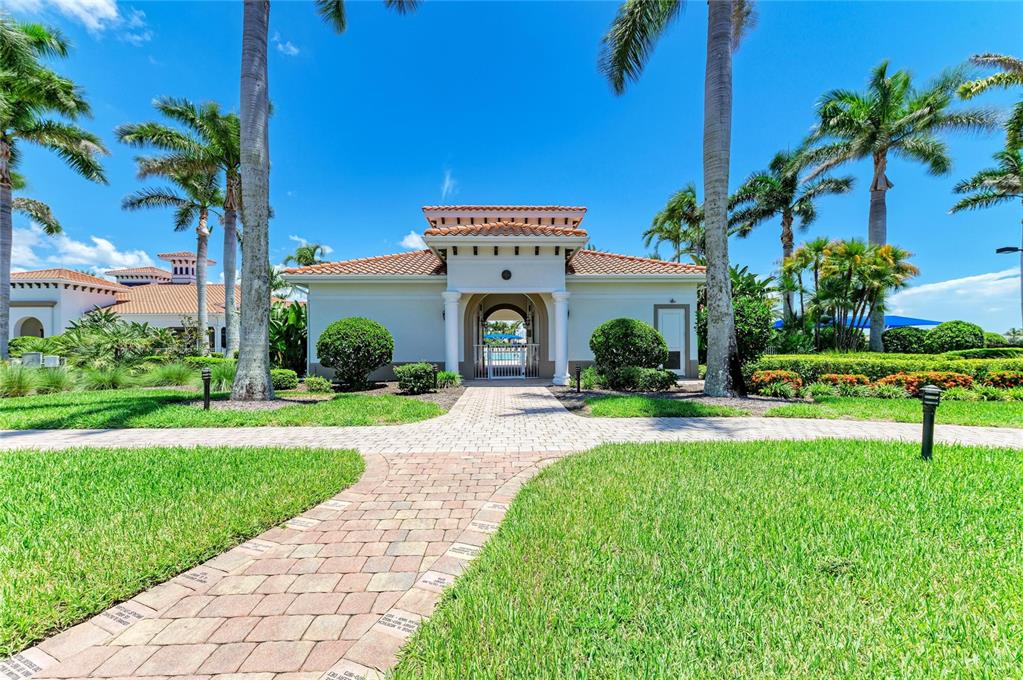 6073 Erice Street Venice, FL 34293 - Photo 61 of 71 a front view of a house with garden