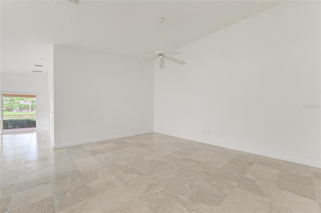 6073 Erice Street Venice, FL 34293 - Photo 8 of 71 a view of an empty room