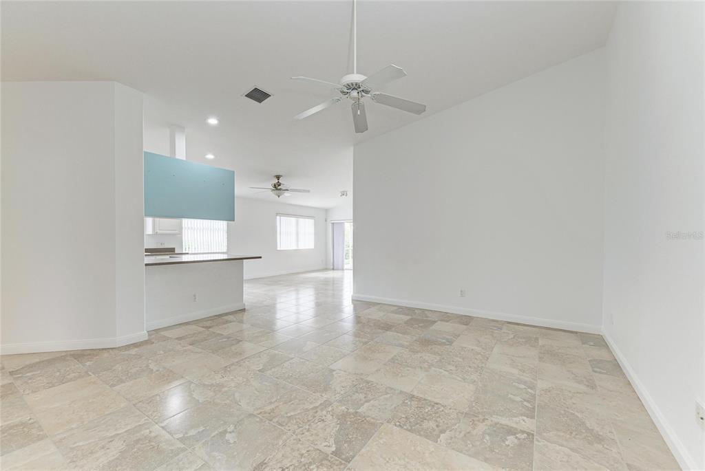 6073 Erice Street Venice, FL 34293 - Photo 9 of 71 a view of a kitchen with a sink and cabinets