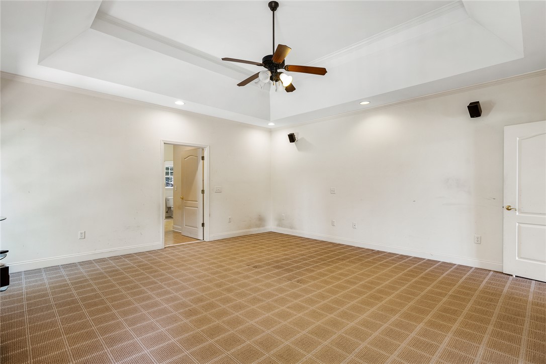 135 Sunset Bay Boulevard Seneca, SC 29672 - Photo 24 of 50 An airy bedroom with a tray ceiling and recessed lighting awaits your personal touch.