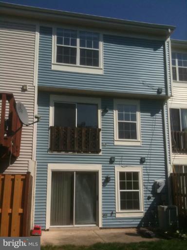 21673 Hazelnut Square, Unit 172 Sterling, VA 20164 - Photo 12 of 15 a front view of a house