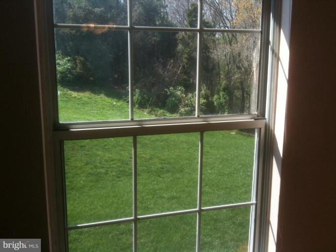 21673 Hazelnut Square, Unit 172 Sterling, VA 20164 - Photo 14 of 15 a view of a glass entrance