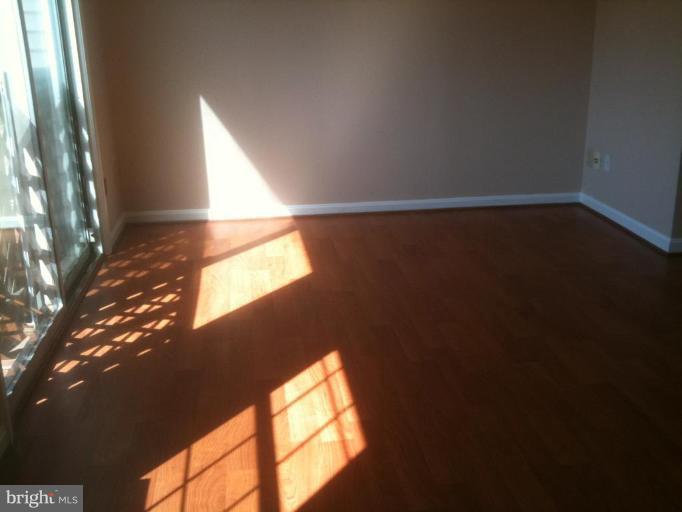 21673 Hazelnut Square, Unit 172 Sterling, VA 20164 - Photo 8 of 15 a view of an empty room and window