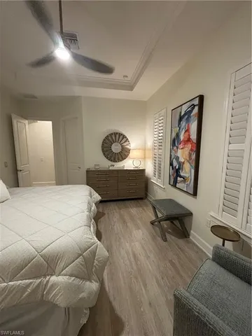 a bedroom with furniture and a couch