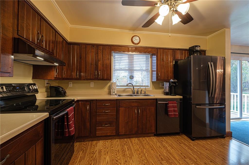 1033 Old Harper Road Crescent, PA 15046 - Photo 3 of 25 Kitchen opens to the dining room with easy access to the rear deck.