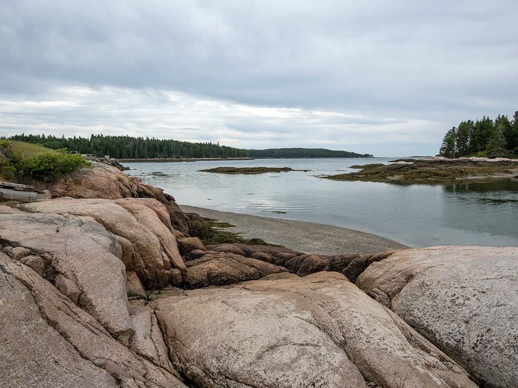 67 Rowe Road Swans Island, ME 04685 - Photo 29 of 35 Granite ledges and cove at mid to...