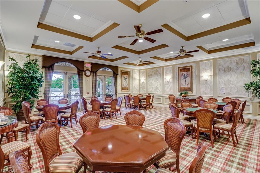 9158 Springview Loop Estero, FL 33928 - Photo 8 of 14 a outdoor space with lots of furniture and glass windows
