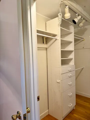 a workspace with furniture and wooden floor