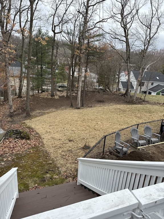 14 Lilac Circle Wellesley, MA 02482 - Photo 31 of 35 a view of a wooden floor with a yard