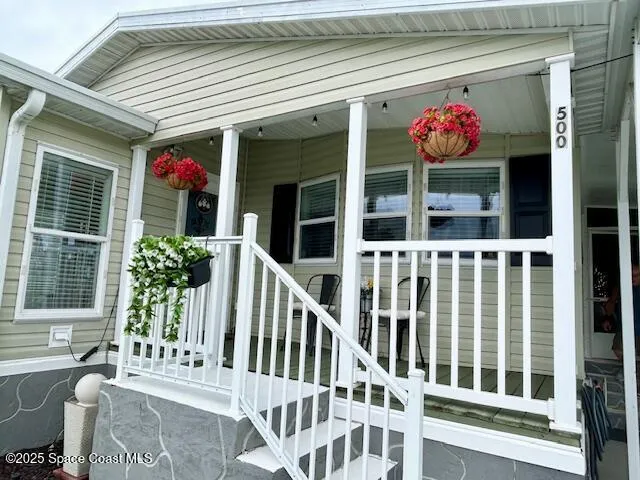 a front view of a house with a porch