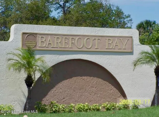 a sign that is on the side of a building