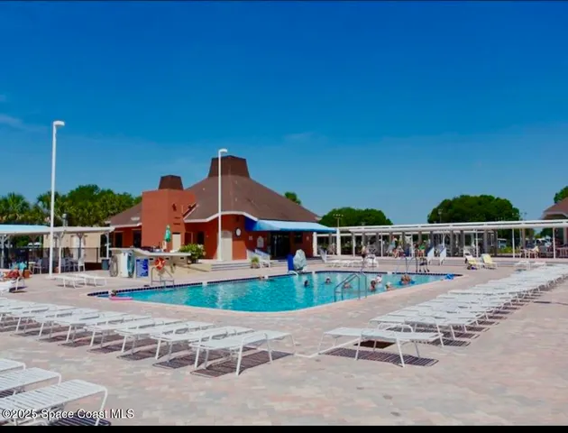 a view of houses with wooden floor and city view