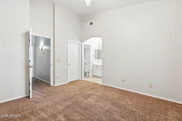 a room with a window and mirror