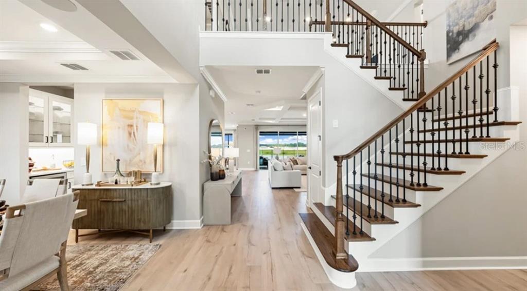 13618 Cornerstone Way Parrish, FL 34219 - Photo 8 of 27 a view of entryway and hall with wooden floor