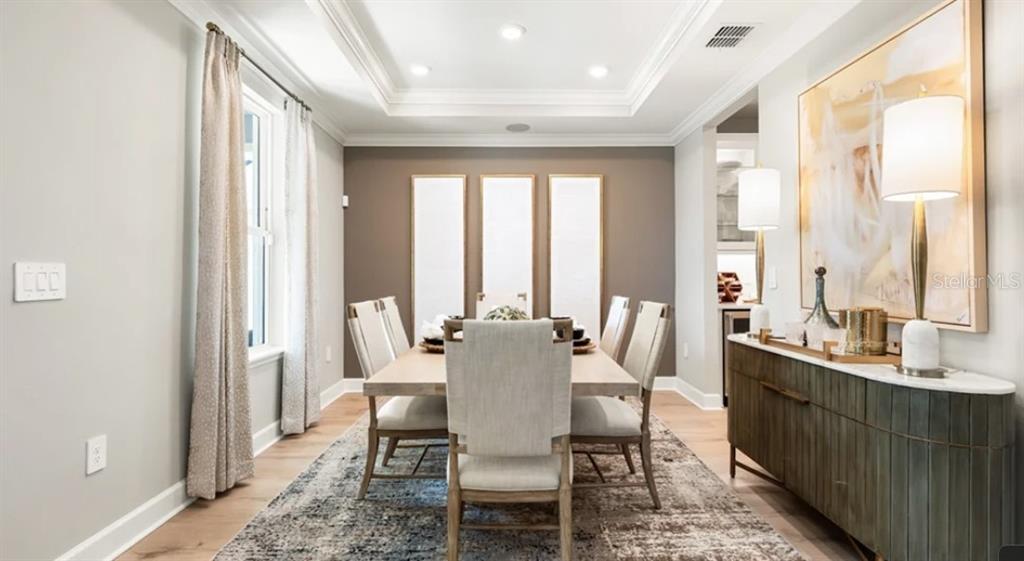 13618 Cornerstone Way Parrish, FL 34219 - Photo 9 of 27 a view of a dining room with furniture window and outside view