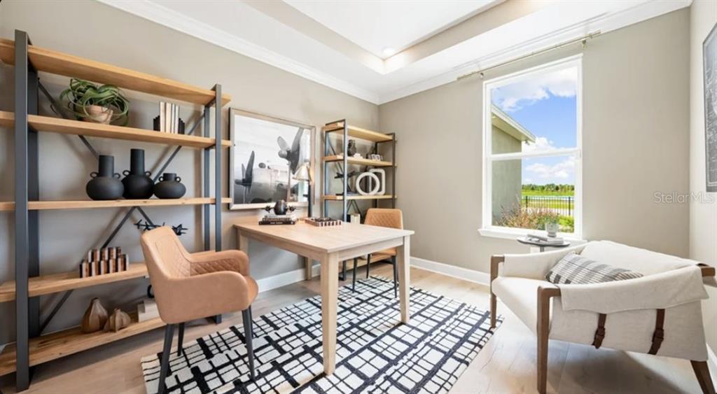 13618 Cornerstone Way Parrish, FL 34219 - Photo 10 of 27 a living room with furniture and a window