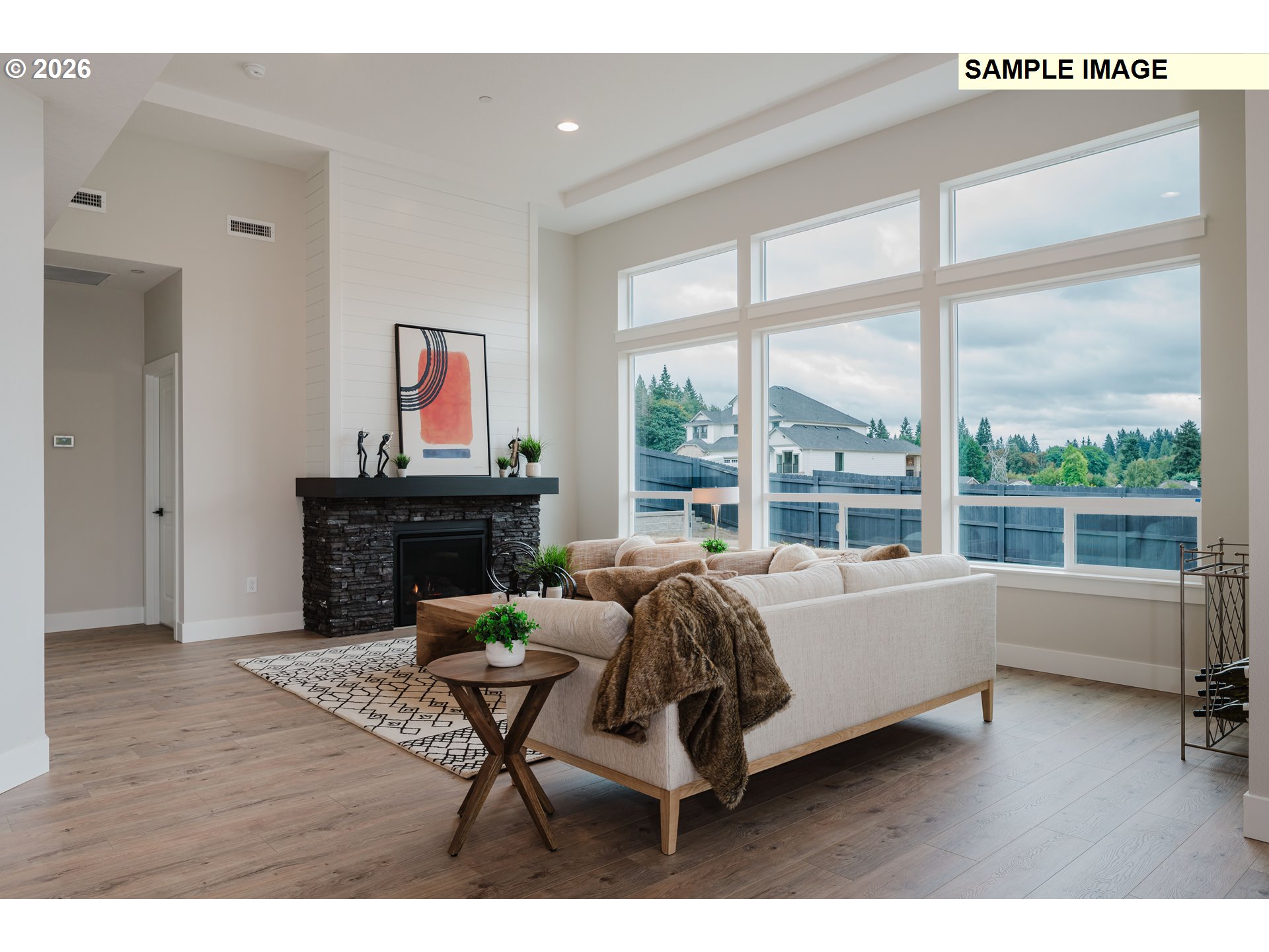 1403 North 41st Place Ridgefield, WA 98642 - Photo 6 of 30 a bedroom with furniture and a large window