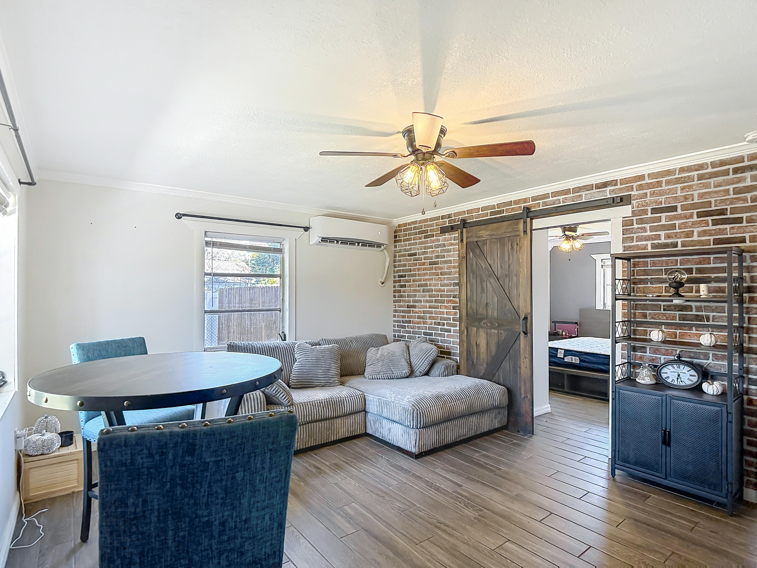 5335 Lemon Avenue Seffner, FL 33584 - Photo 6 of 34 a living room with furniture and wooden floor