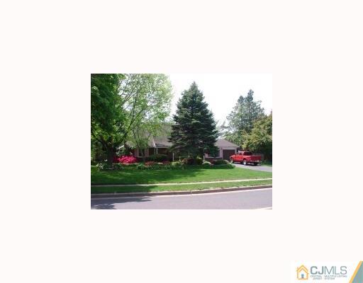 27 MacAfee Road Somerset, NJ 08873 - Photo 1 of 8 a picture of a person on a street