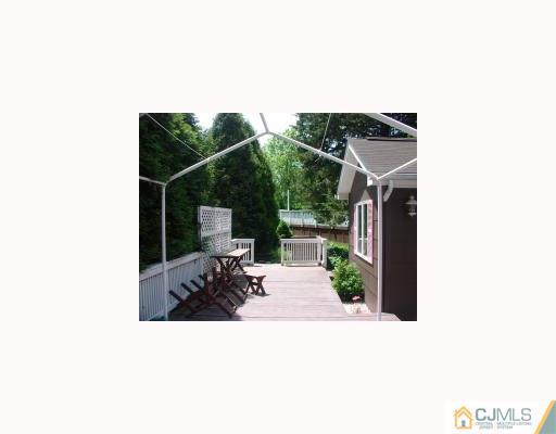 27 MacAfee Road Somerset, NJ 08873 - Photo 4 of 8 a outdoor living space with furniture